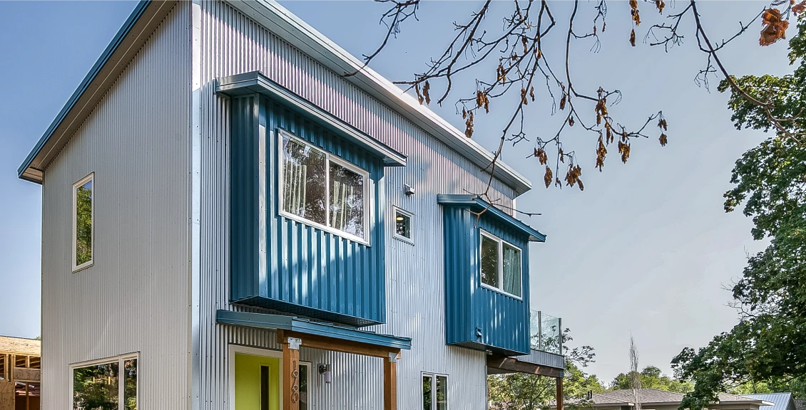 Stylish urban house with metal facade.